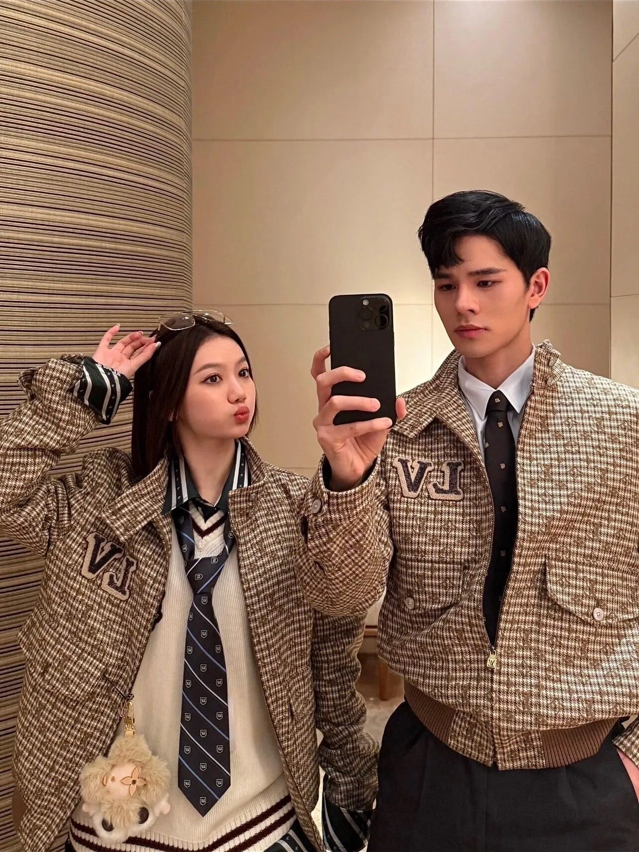 Louis Vuitton jacket with embroidered badges and all-over monogram print.